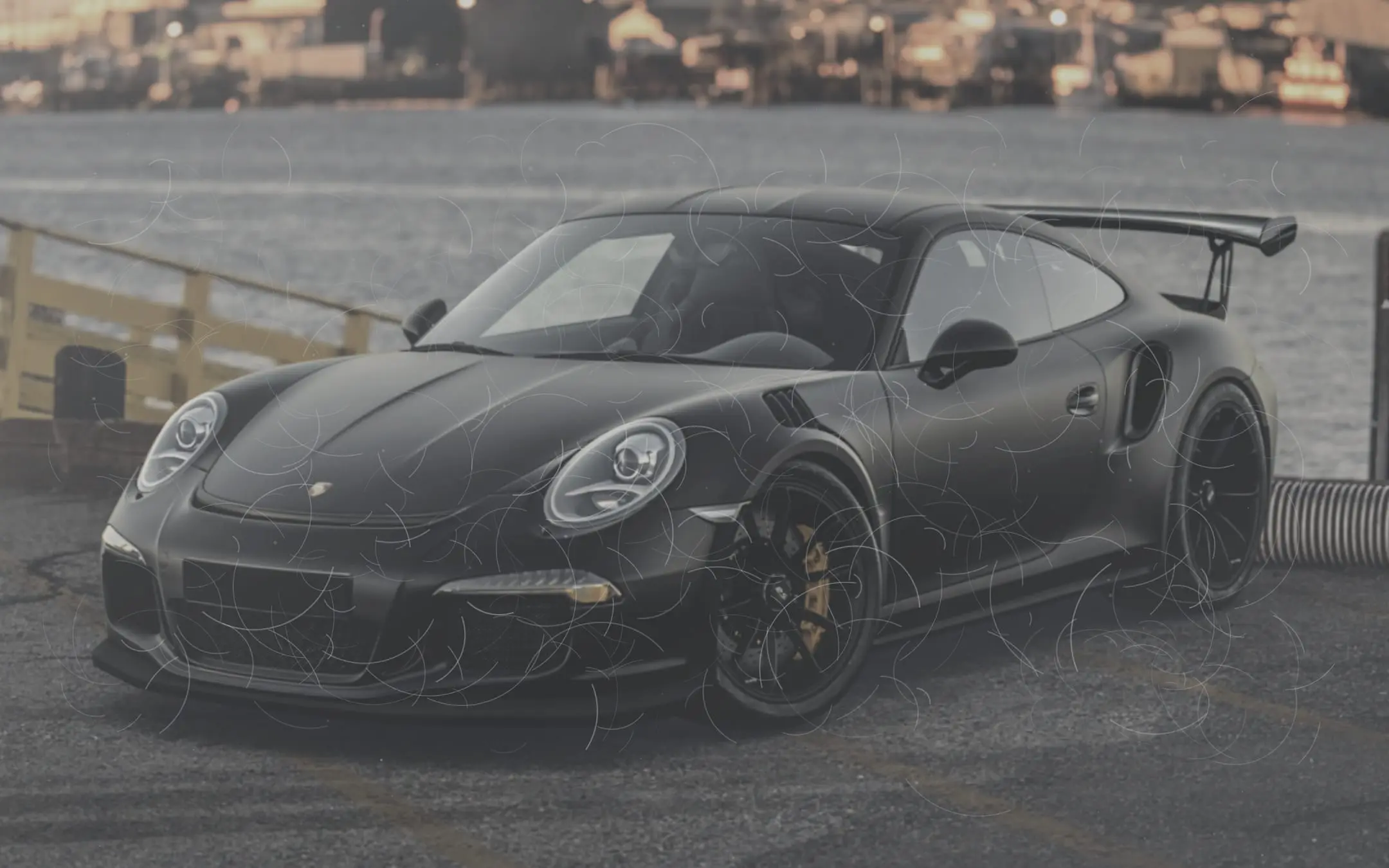 The Porsche on arrival: hazy paint with visible swirl marks and low contrast reflections